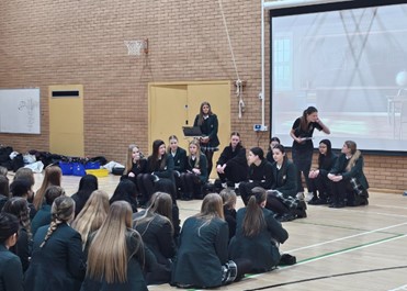 Year 10 students delivering 'Commitment' assembly