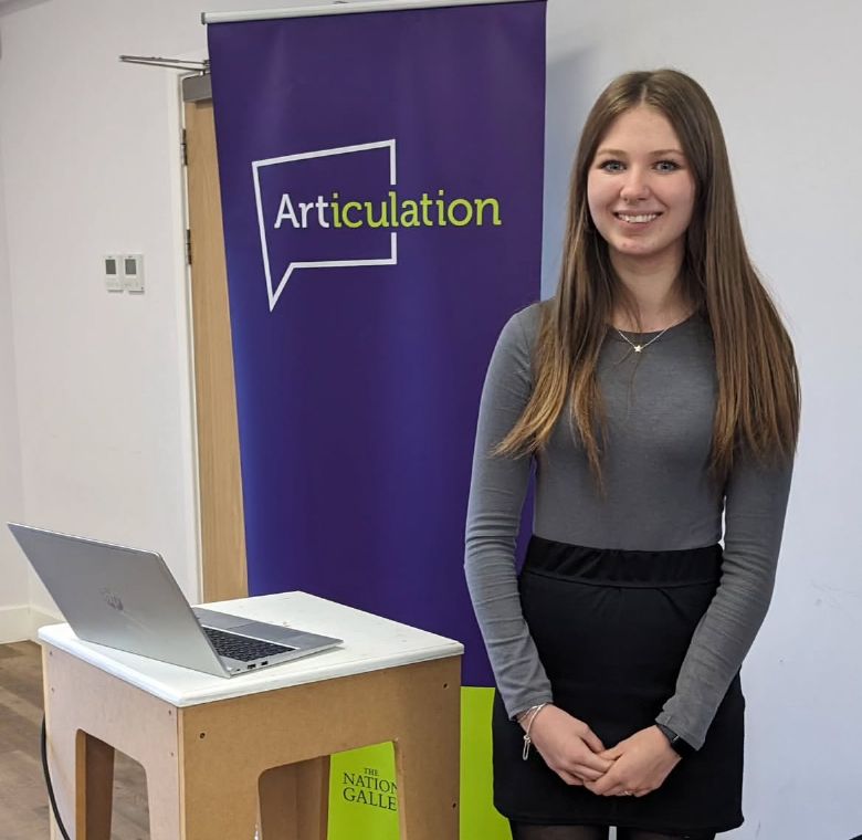 Student pictured next to Articulation logo banner.